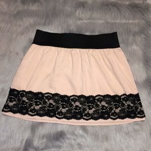 Pink and black laced skirt